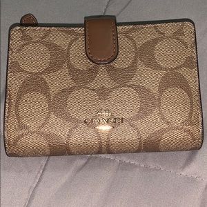 Coach medium corner zip wallet